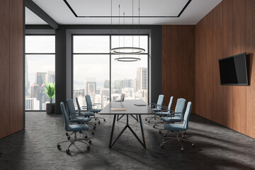 Modern business room interior with meeting table and tv screen, panoramic window