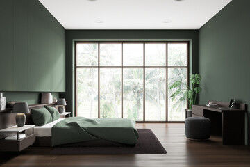 Green home bedroom interior with bed and workplace, panoramic window