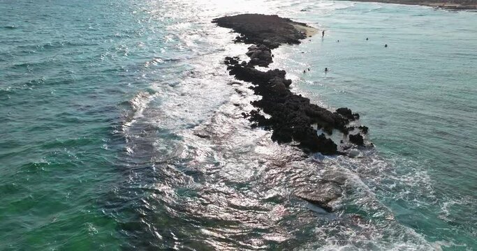 Aerial view of Nissi beach in Ayia Napi, Cyprus. Beautiful rocks in the sea with a well-known beach. High quality 4k footage