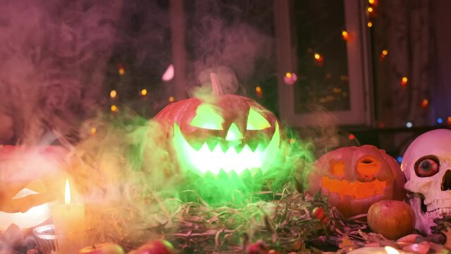 Glowing jack-o-lantern thick smoke emanating from inside, in night time celebrating Halloween background holiday decoration creative spooky invitation.
