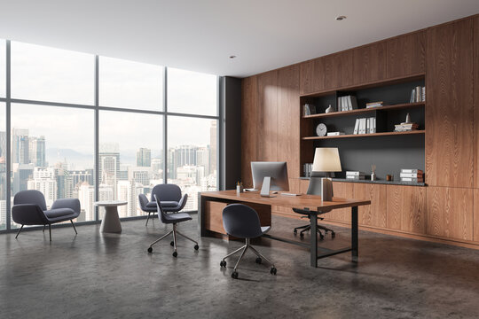 Gray and wooden CEO office corner with armchairs