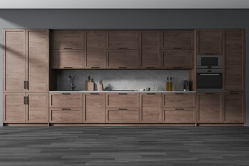 Wooden and gray kitchen interior with cabinets