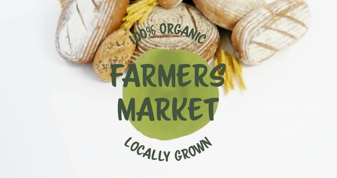 Animation of 100 percent farmers market locally grown text banner over close up of variety of bread