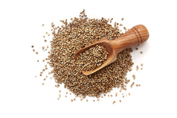 A pile of Organic Pearl Millet (Pennisetum glaucum) or Bajra with a wooden scoop, isolated on a white background. Top view  