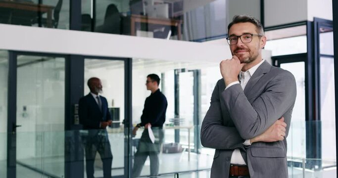 Management, leadership and a business man arms crossed in the office of a corporate company looking confident. Portrait, space and a mature CEO or manager in a professional workplace as an executive