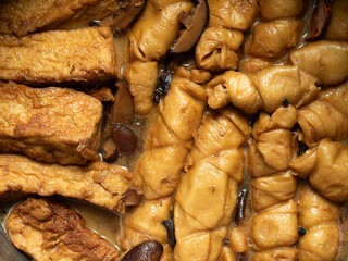 braised wheat gluten rolls with fried tofu and shitake mushroom