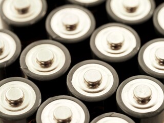 Macro of many positive aa battery terminals