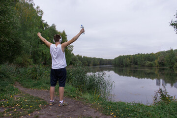 The athlete is resting in nature after training, running