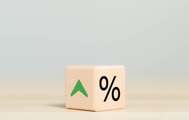 Wooden blocks showing increasing interest rates, high, increasing credit, business, banks,...
