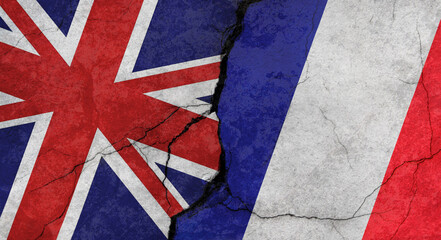 UK and French flags, cracked concrete wall texture, grunge background, military conflict concept