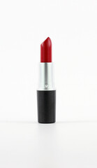 Obraz premium Red Lipstick Photography On White Background - Cosmetics Product