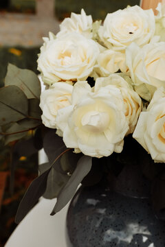 white roses in a vase