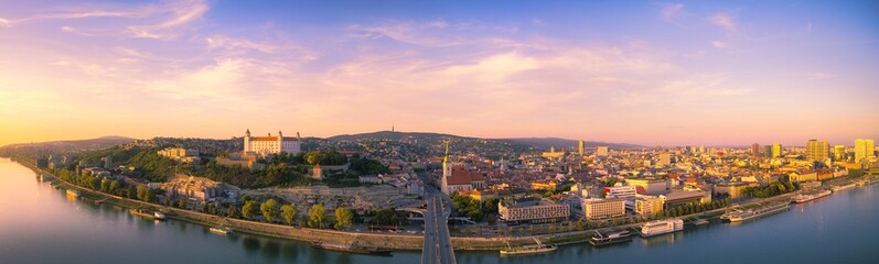 Fototapeta na wymiar The capital Bratislava before sunset in a wide panorama, Slovakia