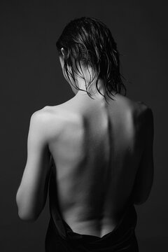 Naked Female back. Black and white portrait