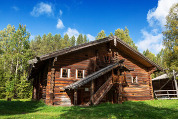 Fototapeta premium The house-yard of the peasant Shchegolev, 1826 in the museum of wooden architecture 