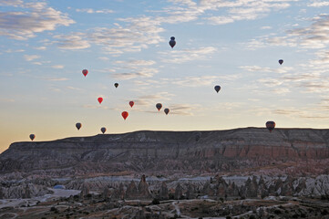 Hot air balloon and fairy chimneys in Cappadocia