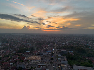 Aerial view of Pekanbaru city skyline during sunset. Capital city of Riau province in Indonesia.
