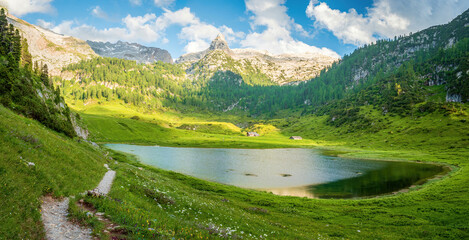 Bavarian hiking nature landscape with lake and scenic mountain background