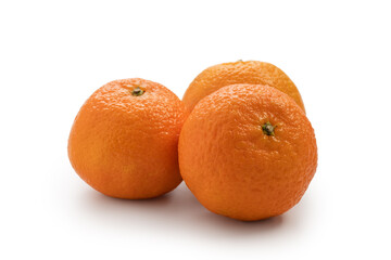 Three bright orange tangerine isolated on white