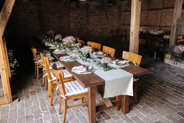 Beautiful table decoration at barn wedding