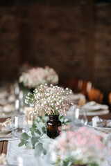 Obraz na płótnie Canvas Beautiful table decoration at barn wedding