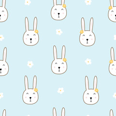 Baby seamless pattern cute rabbit face on blue background hand drawn design in cartoon style Used for prints, decorative wallpaper, textiles, vector illustrations.