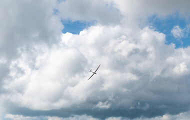 Gliderplane soaring high in the sky