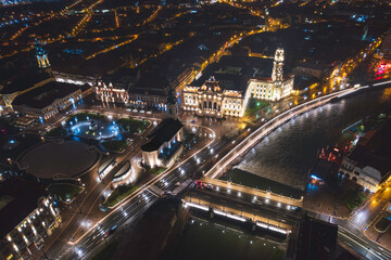 Obraz premium Oradea romania tourism aerial a mesmerizing aerial view of a historic European city at night, showcasing its iconic attractions