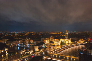 Fototapeta premium Oradea romania tourism aerial a stunning nighttime view of a historic European city from a rooftop