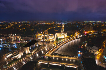 Oradea romania tourism aerial a stunning aerial view of a European city illuminated at night, showcasing its rich heritage and historic attractions