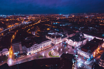 Fototapeta na wymiar Oradea romania tourism aerial a mesmerizing aerial view of a historic European city illuminated at night