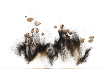 Gold ore nugget mix sand explode from Mining. Golden nugget ore grain powder explosion with sand stone gravel in gold Mining industry. White background Isolated throwing freeze stop motion