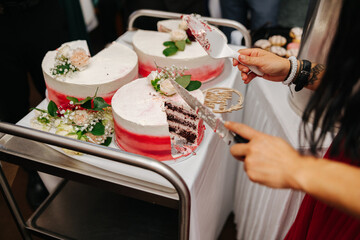 Cut cake at a wedding buffet