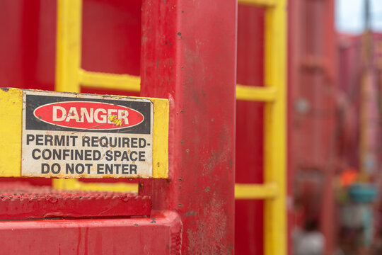 Confined space caution information sign, the work permit was requested for working in this area, industrial working safety sign, object photo. 