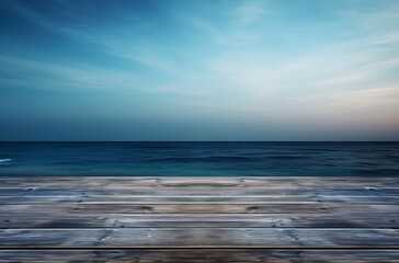 Obraz premium Wooden pier on the background of the sea and blue sky.