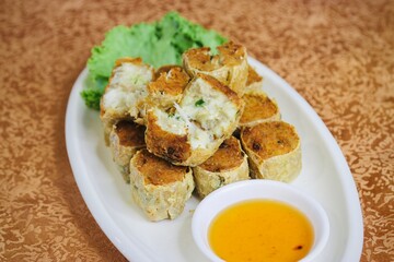 Savor the exquisite flavors of our delectable crab 
Dumplings, a perfect blend of savory crabmeat and delicate seasonings in every bite.