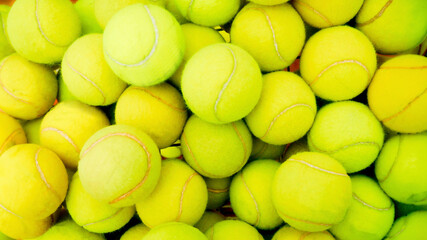 detail of baskets with several tennis balls