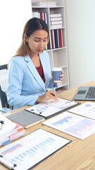 Thinking about how to take the business to technological heights. Cropped shot of an attractive young businesswoman working in her office.