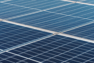 close up of solar panels. solar power plant generating sustainable renewable energy. 