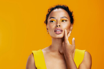 Creative woman face black african smile colourful beautiful portrait make-up cosmetic beauty yellow...