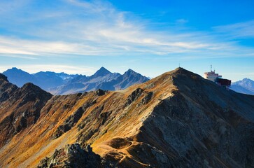 Beautiful autumn hike to the Jakobshorn above Davos Klosters Mountains. Mountaineering in the Swiss...