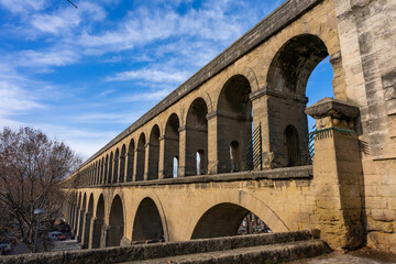 Fototapeta na wymiar Montpellier, France - January 16 2023 - The aquaduct Saint Clement in Montpellier