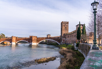 Verona, Italy - January 21 2023 - River Adige with in the background the Castelvecchio Museum