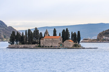 Strp, Montenegro - 27 january 2023 - View on the Catholic monastery of Saint George - (Manastiri Katolik i Shën Gjergjit) in  the Bay of Kotor (Бока Которска) - obrazy, fototapety, plakaty