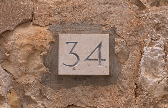 House number 34 in old Roman style
