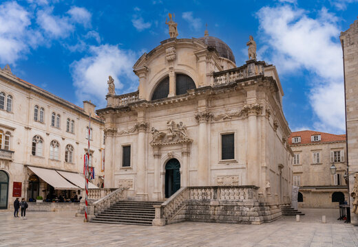 Dubrovnik, Croatia - January 26 2023 - tourists visiting the St Blaises Church in the center of the medeival town of Dubrovnik