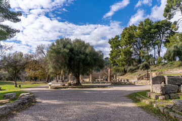 Obraz premium Olympia, Greece - 6 February 2023 - Old ruins in the old town of Olympia (Archaia Olympia)