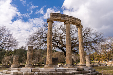 Fototapeta na wymiar Olympia, Greece - 6 February 2023 - Old ruins in the old town of Olympia (Archaia Olympia)