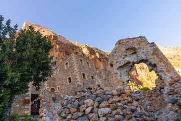 Monemvasia, Greece - 12 February 2023 - View on the island of Monemvasia at a old arch and the upper town