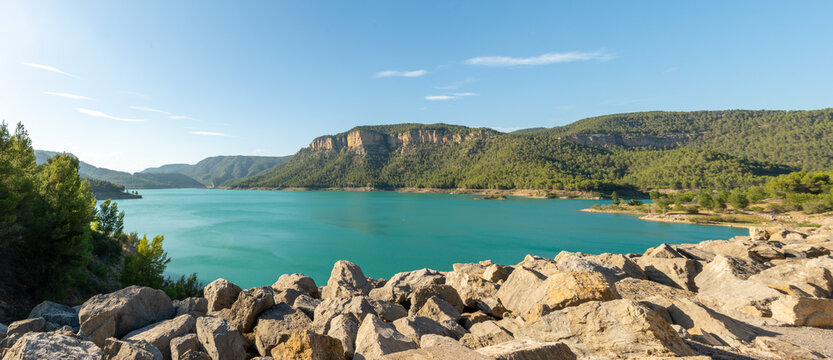Panorama view over Embassament d'Arenos, Montanejos, Spain. Scenic landscape of a blue water lake. Balnear springs of Montanejos, Spain.